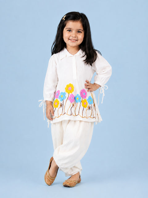 Girls White Embroidered Kurta & Dhoti Set – Colorful Floral Festive Wear